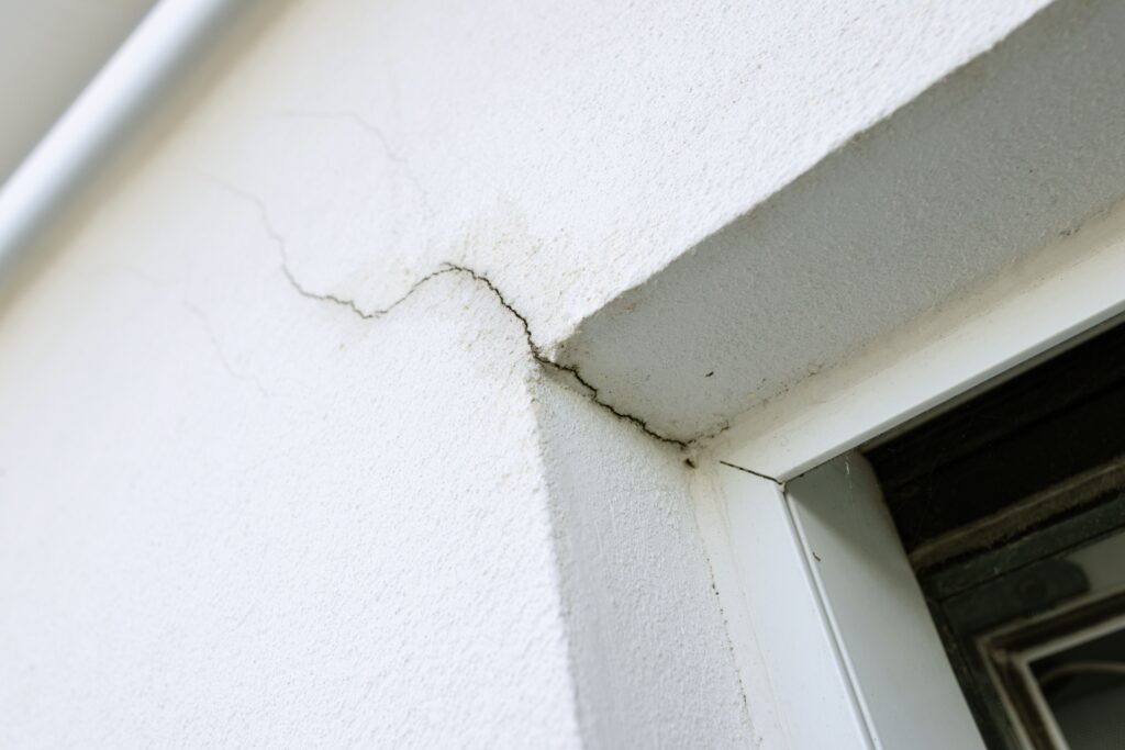 cracks around windows and doors suggest a sinking or otherwise struggling foundation