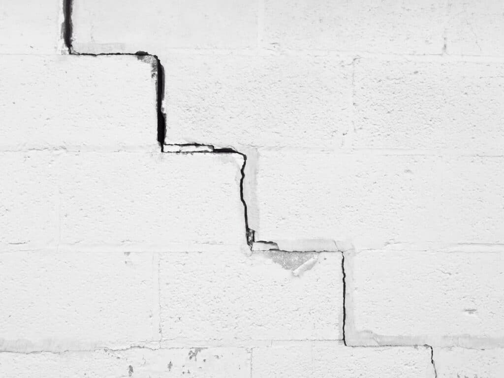 Stair-step crack in a concrete block basement wall