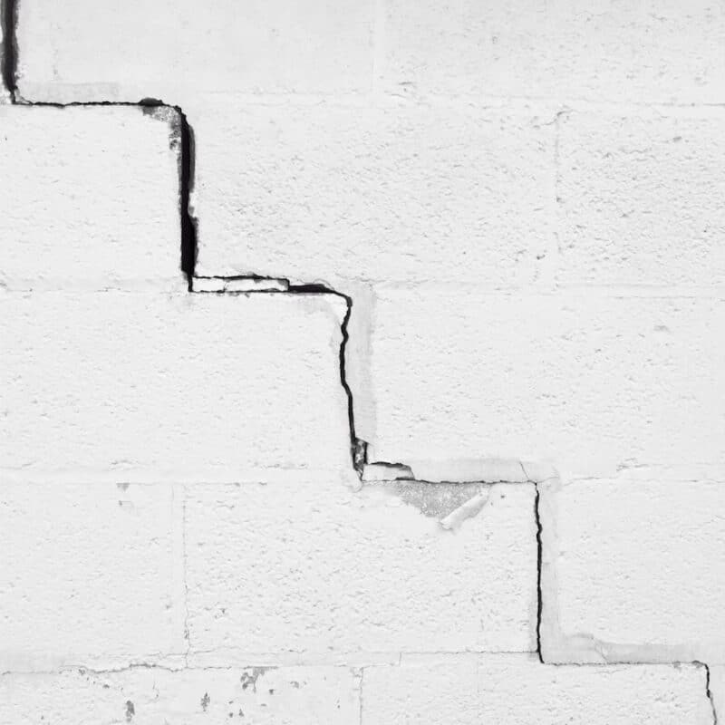 Stair-step crack in a concrete block basement wall